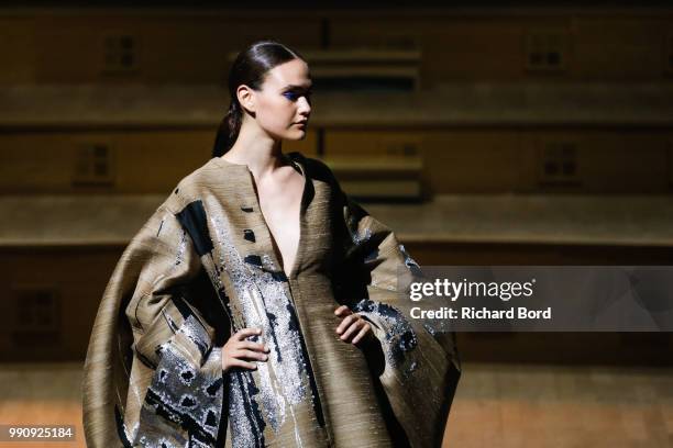 Model walks the runway during the Stephane Rolland Haute Couture Fall Winter 2018/2019 show at Maison de la Radio as part of Paris Fashion Week on...