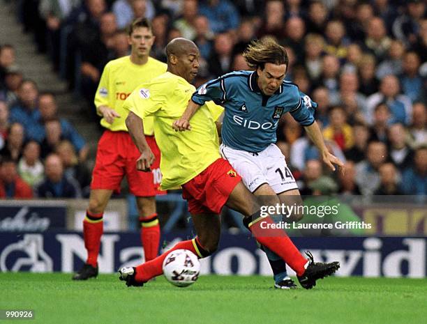 Eyal Berkovic of Man City is tackled by Marcus Gayle of Watford during the Manchester City v Watford Nationwide Division One match at Maine Road,...