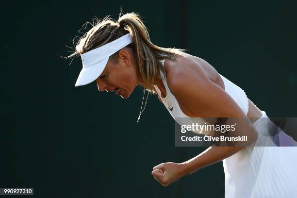 Maria Sharapova of Russia celebrates a point against Vitalia Diatchenko of Russia during their Ladies' Singles first round match on day two of the...