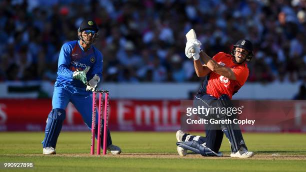 David Willey of England hits out for six runs during the 1st Vitality International T20 match between England and India at Emirates Old Trafford on...