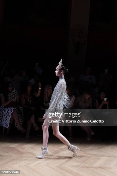 Model walks the runway during the Tony Ward Haute Couture Fall Winter 2018/2019 show as part of Paris Fashion Week on July 2, 2018 in Paris, France.