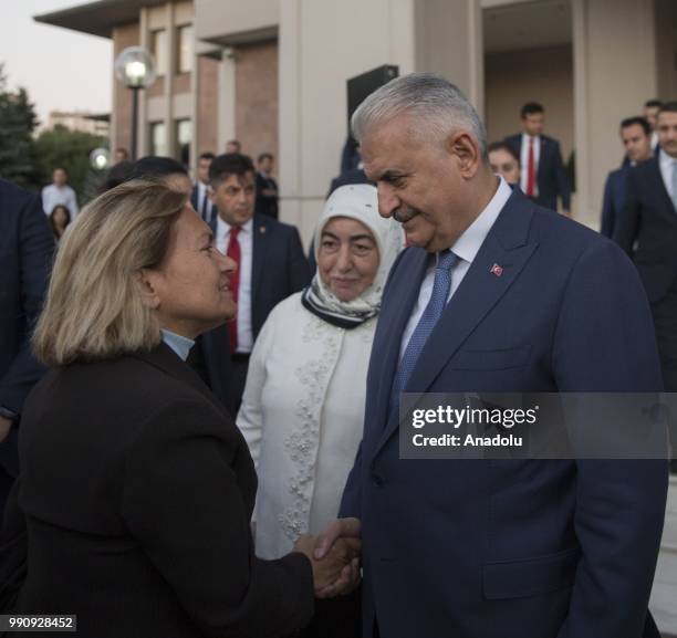 Turkish Prime Minister Binali Yildirim and his wife Semiha Yildirim attend a farewell programme at the official ceremony area of the garden of...