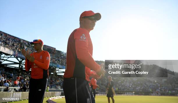 England captain Eoin Morgan leads his team on to the field for the second innings during the 1st Vitality International T20 match between England and...