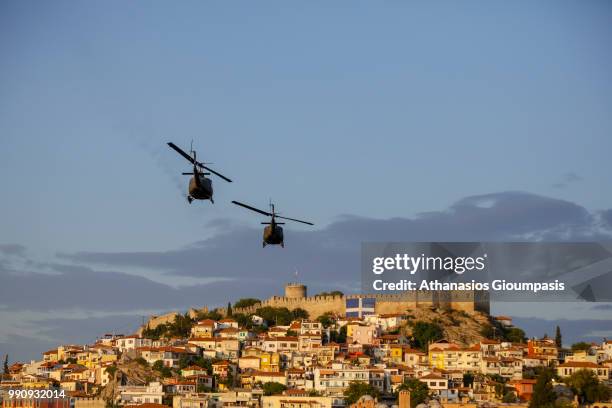 Huey helicopters performs an aerobatic display during the Kavala Air Sea Show on June 30, 2018 in Kavala, Greece. The Iroquois was originally...