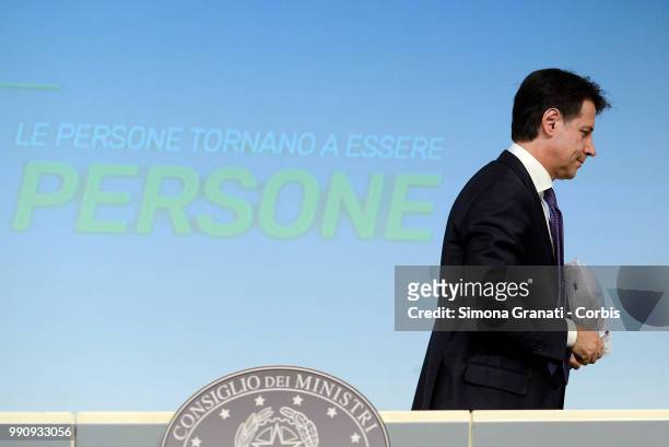 Prime Minister of Italy Giuseppe Conte leaves after the presentation to the press of the Dignity Decree approved by the government on July 03, 2018...