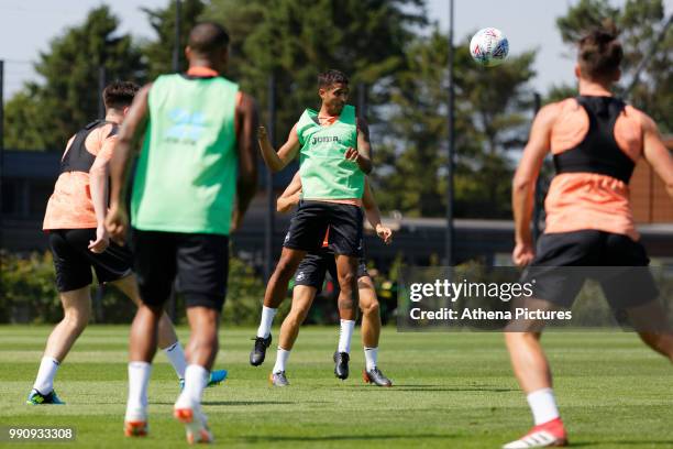 Kyle Naughton heads the ball during the Swansea City Training Session at The Fairwood Training Ground on July 03, 2018 in Swansea, Wales.