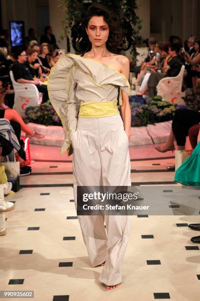 Model walks the runway at the Anja Gockel show during the Berlin Fashion Week Spring/Summer 2019 at Hotel Adlon on July 3, 2018 in Berlin, Germany.