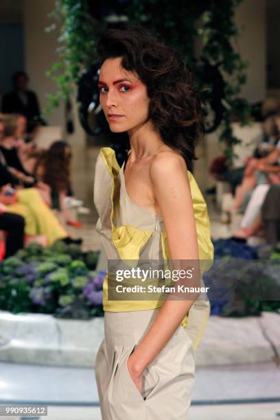 Model walks the runway at the Anja Gockel show during the Berlin Fashion Week Spring/Summer 2019 at Hotel Adlon on July 3, 2018 in Berlin, Germany.