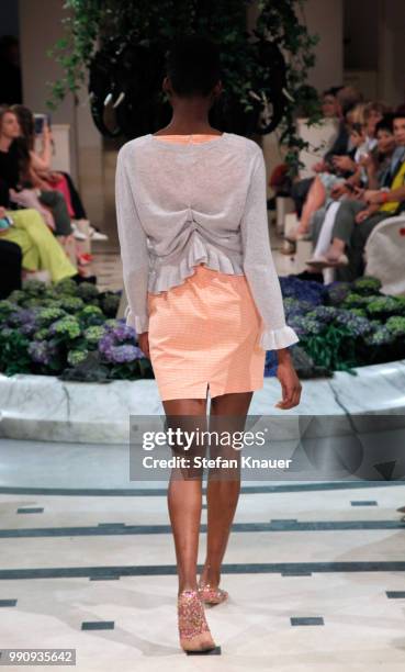 Model walks the runway at the Anja Gockel show during the Berlin Fashion Week Spring/Summer 2019 at Hotel Adlon on July 3, 2018 in Berlin, Germany.