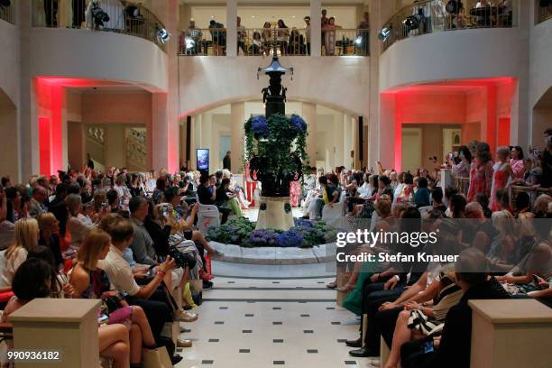 Models walk the runway at the Anja Gockel show during the Berlin Fashion Week Spring/Summer 2019 at Hotel Adlon on July 3, 2018 in Berlin, Germany.