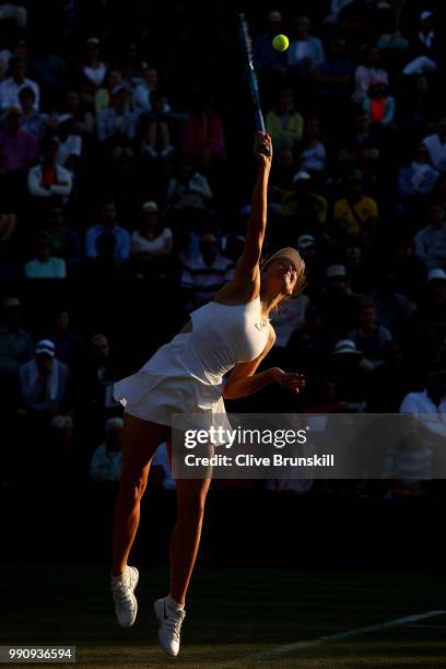 Maria Sharapova of Russia serves against Vitalia Diatchenko of Russia during their Ladies' Singles first round match on day two of the Wimbledon Lawn...