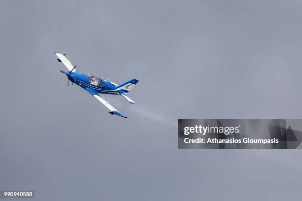 FlyLatino FL-100RGs aircraft of the Italian Blu Circe Team perform an aerobatic display during the Kavala Air Sea Show on June 30, 2018 in Kavala,...