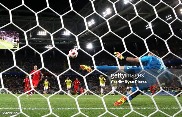 Harry Kane of England scores the opening goal from a penalty past David Ospina of Colombia during the 2018 FIFA World Cup Russia Round of 16 match...