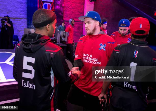 TsJosh of Raptors Uprising Gaming Club shakes hands with Lets Get It Ramo of Pistons Gaming Team after the game on June 30, 2018 at the NBA 2K League...