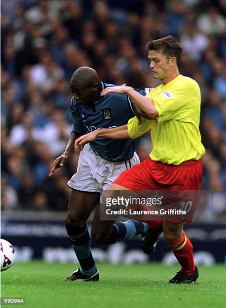 Paulo Wanchope of Man City battles with Stephen Hughes of Watford during the Manchester City v Watford Nationwide Division One match at Maine Road,...