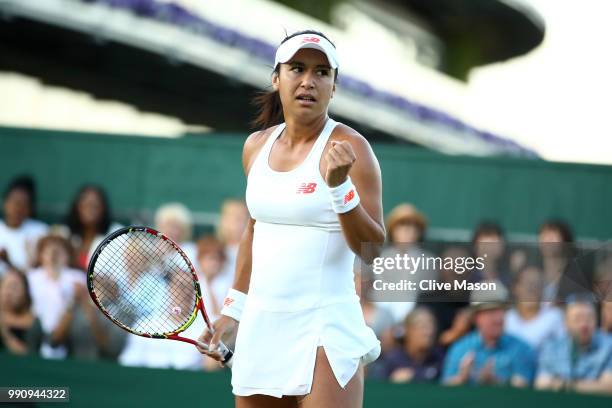 Heather Watson of Great Britain celebrates a point against Kirsten Flipkens of Belgium during their Ladies' Singles first round match on day two of...