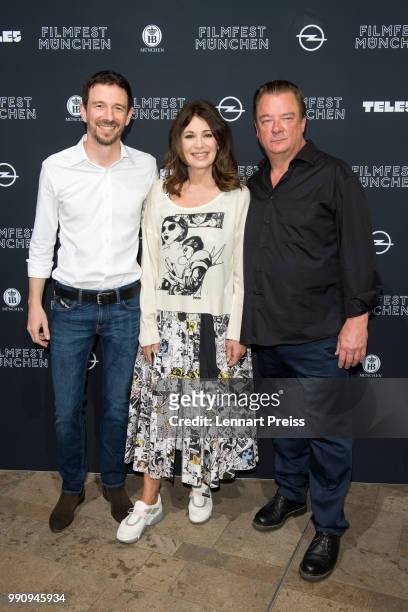 Oliver Berben, Iris Berben and Peter Kurth attend the premiere of the first and second episode of the series 'Die Protokollanttin' as part of the...