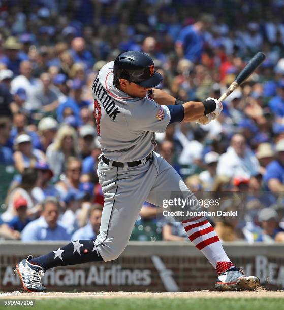 Mikie Mahtook of the Detroit Tigers singles in the1st inning against the Chicago Cubs at Wrigley Field on July 3, 2018 in Chicago, Illinois.