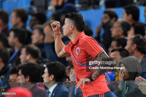 James Rodriguez of Colombia recats from the stabds during the 2018 FIFA World Cup Russia Round of 16 match between Colombia and England at Spartak...