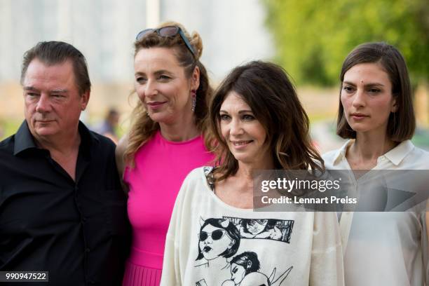 Peter Kurth , Munich Film Festival director Diana Iljine, Iris Berben and Laura de Boer attend the premiere of the first and second episode of the...