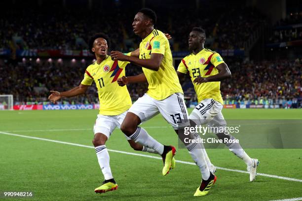 Yerry Mina of Colombia celebrates after scoring his team's first goal during the 2018 FIFA World Cup Russia Round of 16 match between Colombia and...