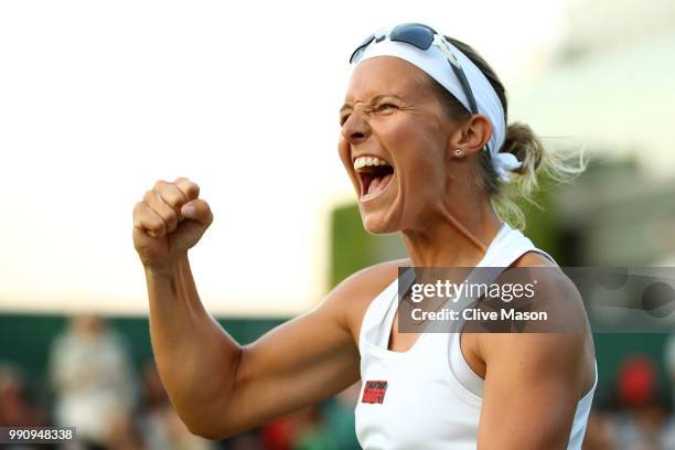 Kirsten Flipkens of Belgium celebrates her victory over Heather Watson of Great Britain after their Ladies' Singles first round match on day two of...