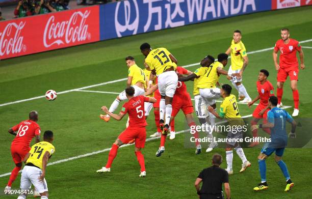 Yerry Mina of Colombia scores his team's first goal during the 2018 FIFA World Cup Russia Round of 16 match between Colombia and England at Spartak...