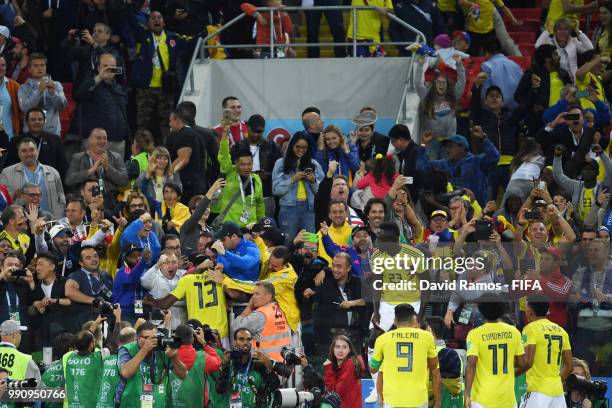 Yerry Mina of Colombia celebrates with the fans after scoring his team's first goal during the 2018 FIFA World Cup Russia Round of 16 match between...
