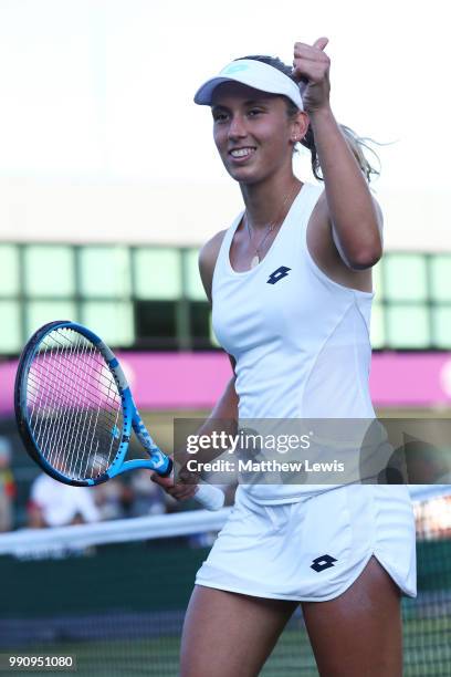 Elise Mertens of Belgium returns against Danielle Collins of The United States on day two of the Wimbledon Lawn Tennis Championships at All England...