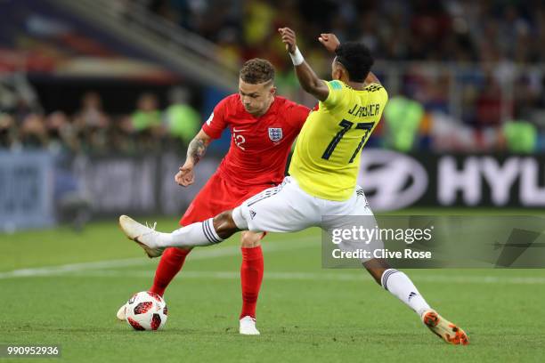 Johan Mojica of Colombia tackles Kieran Trippier of England during the 2018 FIFA World Cup Russia Round of 16 match between Colombia and England at...