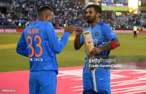 Lokesh Rahul of India celebrates with Hardik Pandya after winning the 1st Vitality International T20 match between England and India at Emirates Old...