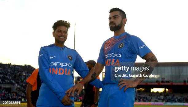 Virat Kohli and Kuldeep Yadav of India after winning the 1st Vitality International T20 match between England and India at Emirates Old Trafford on...