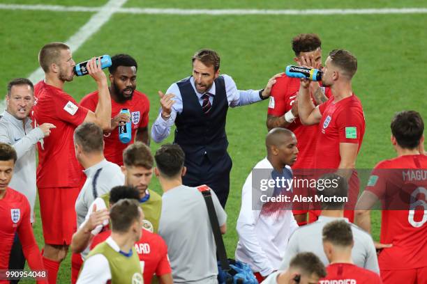 Gareth Southgate, Manager of England instructs players before extra time during the 2018 FIFA World Cup Russia Round of 16 match between Colombia and...