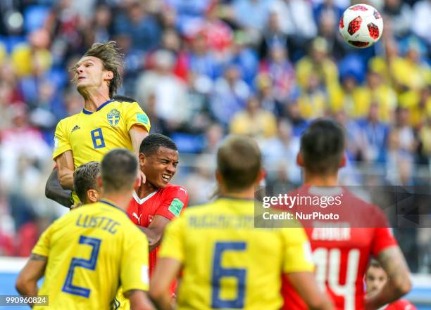 Albin Ekdal of the Sweden national football team vie for the ball during the 2018 FIFA World Cup match, Round of 16 between Sweden and Switzerland at...