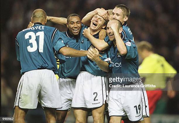 Stuart Pearce of Man City is mobbed after scoring during the Manchester City v Watford Nationwide Division One match at Maine Road, Manchester....