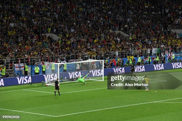 Radamel Falcao of Colombia scores his team's first penalty pats Jordan Pickford of England in the penalty shoot out during the 2018 FIFA World Cup...