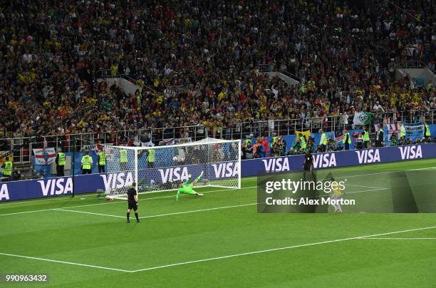 Radamel Falcao of Colombia scores his team's first penalty pats Jordan Pickford of England in the penalty shoot out during the 2018 FIFA World Cup...