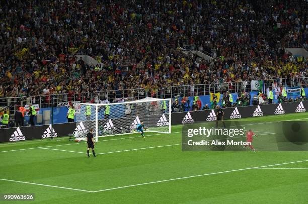 Harry Kane of England scores his team's first penalty in the penalty shoot out during the 2018 FIFA World Cup Russia Round of 16 match between...