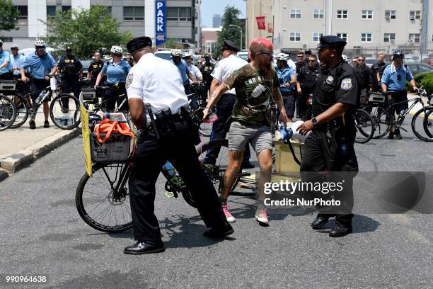 Police clears protestors from blocking the loading dock of a Department of Homeland Security U.S. Immigrations and Custom Enforcement office in...