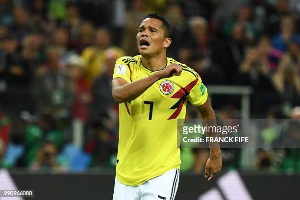 Colombia's forward Carlos Bacca reacts after missing to score a penalty kick during the penalty shoot-out of the Russia 2018 World Cup round of 16...