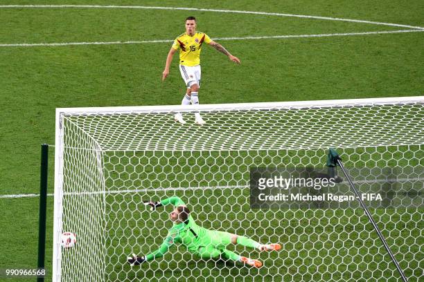 Mateus Uribe of Colombia misses his team's fourth penalty in the penalty shoot out during the 2018 FIFA World Cup Russia Round of 16 match between...