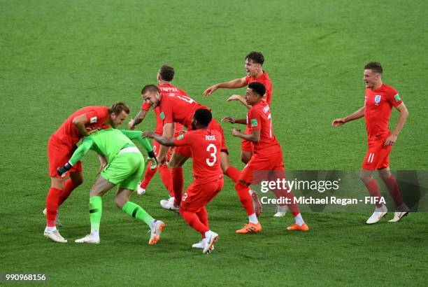 Jordan Pickford of England is mobbed by teammates in celebration after penalty shootout following the 2018 FIFA World Cup Russia Round of 16 match...