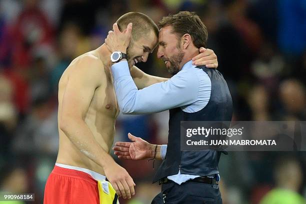 England's coach Gareth Southgate celebrates with England's midfielder Eric Dier after the penalty shootout at the end of the Russia 2018 World Cup...