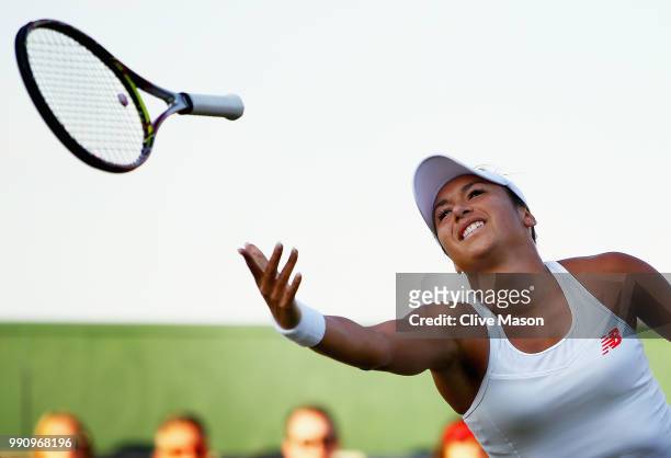 Heather Watson of Great Britain in action against Kirsten Flipkens of Belgium during their Ladies' Singles first round match at the All England Lawn...