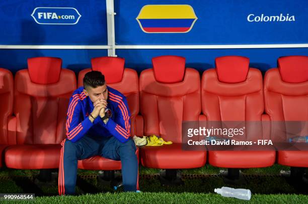 James Rodriguez of Colombia looks dejected following his sides defeat in the 2018 FIFA World Cup Russia Round of 16 match between Colombia and...