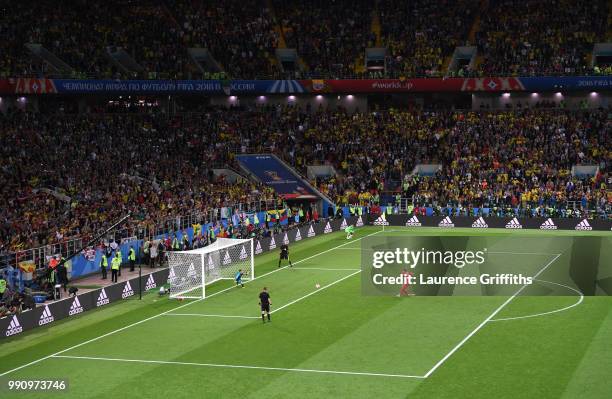 Harry Kane of England scores his team's first penalty in the penalty shoot out during the 2018 FIFA World Cup Russia Round of 16 match between...