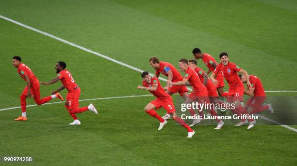 England players celebrate after Eric Dier of England scores the winning penalty during the 2018 FIFA World Cup Russia Round of 16 match between...