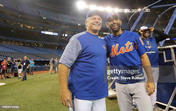 Toronto Blue Jays manager John Gibbons greets former player New York Mets right fielder Jose Bautista during batting practice on his first return to...