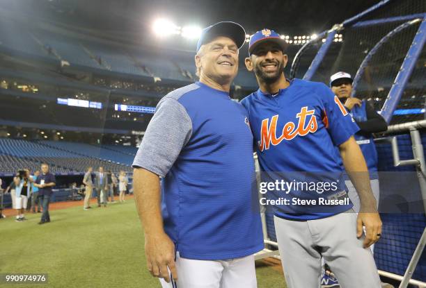 Toronto Blue Jays manager John Gibbons greets former player New York Mets right fielder Jose Bautista during batting practice on his first return to...