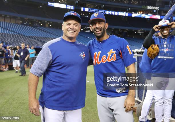 Manager John Gibbons of the Toronto Blue Jays meets with former Blue Jays player Jose Bautista of the New York Mets before the start of MLB game...